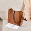 10.1300127 New Arrival Women’s Genuine Leather Saddle Shoulder Bag – Minimalist Style for the Modern Commute