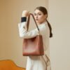 2021.10-21047 New Arrival Women’s Genuine Leather Saddle Shoulder Bag – Minimalist Style for the Modern Commute