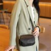 2025 Women’s Genuine Leather Round Crossbody Bag – Minimalist Design with a Bold Street Style Edge