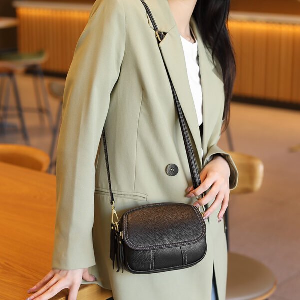 2025 Women’s Genuine Leather Round Crossbody Bag – Minimalist Design with a Bold Street Style Edge