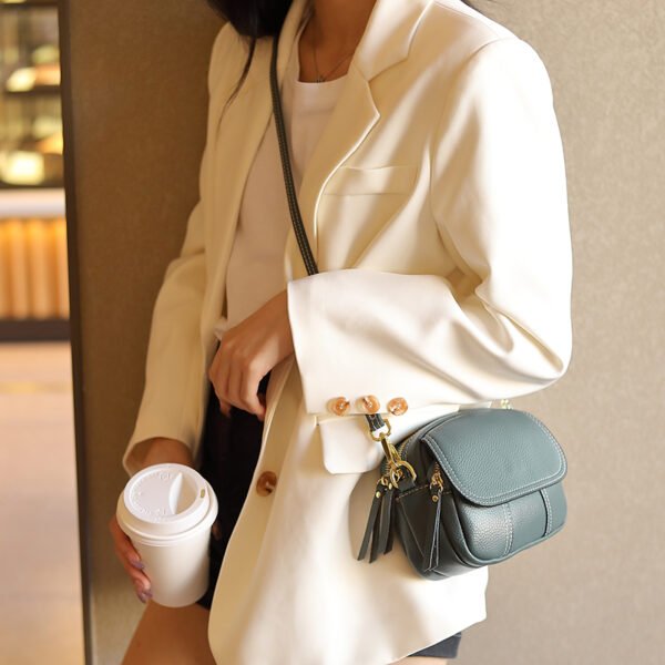 2025 Women’s Genuine Leather Round Crossbody Bag – Minimalist Design with a Bold Street Style Edge