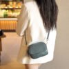 2025 Women’s Genuine Leather Round Crossbody Bag – Minimalist Design with a Bold Street Style Edge