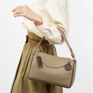 cowhide shoulder handbag