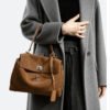 Autumn/Winter New Arrival: Suede and Satin Leather Luxury Kelly Bag with Lock Clasp Handheld, Underarm, Commuter, Single-Shoulder Tote Bag